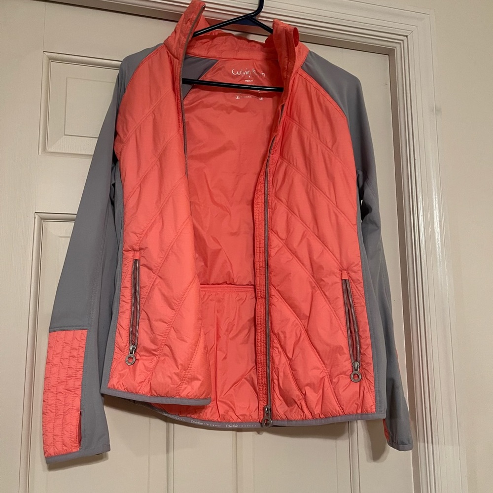 Calvin Klein jacket and carry bag
